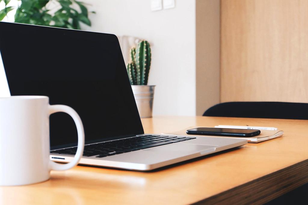 Professional using digital communication skills in workplace